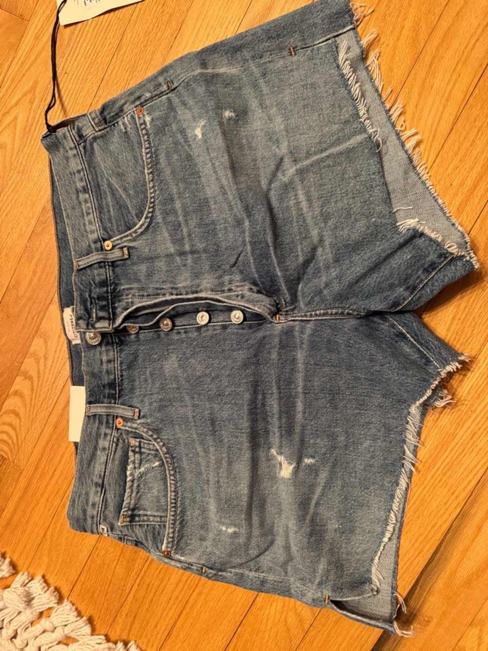 Citizens Of Humanity faded blue denim shorts with button details